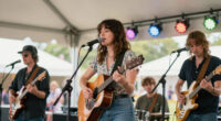 Lucy Dacus Brings Out Brandon Flowers, Hayley Williams, & More At Newport Folk Festival